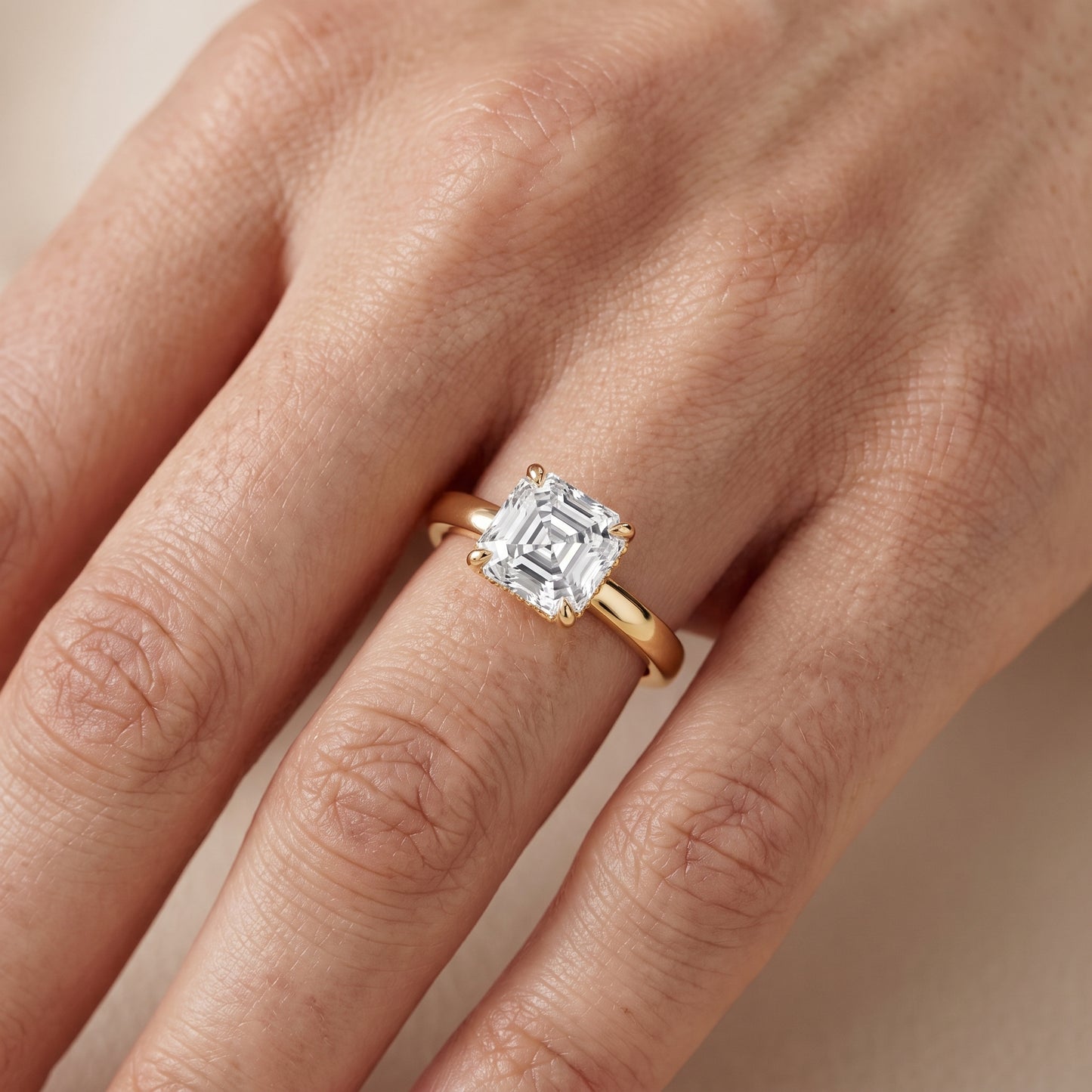 Lara Hidden Halo Asscher Diamond Engagement Ring in Yellow Gold - lifestyle.jpg