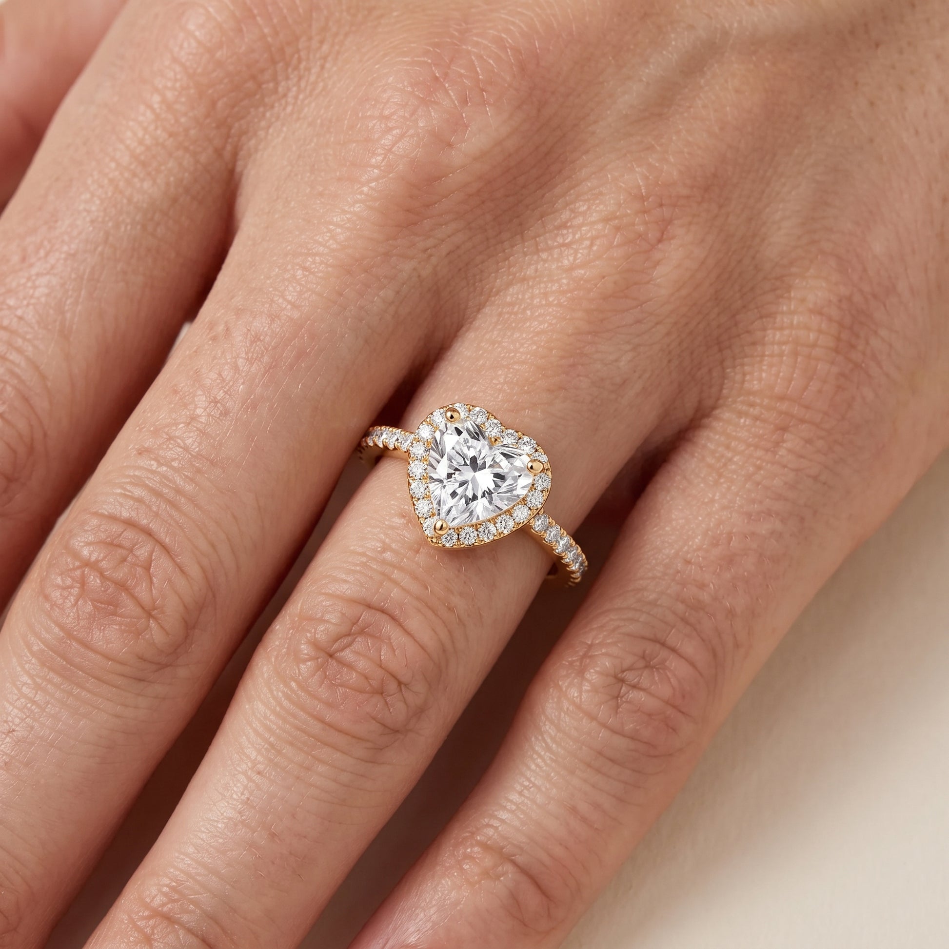 Sophie Halo Pavé Heart Diamond Ring in Yellow Gold - lifestyle.jpg