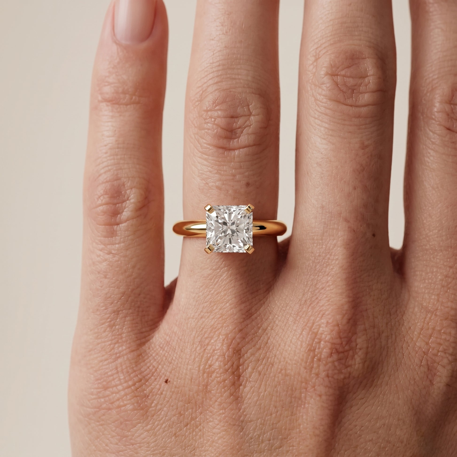 Amira Six-Prong Solitaire Radiant Diamond Engagement Ring in Yellow Gold - lifestyle.jpg