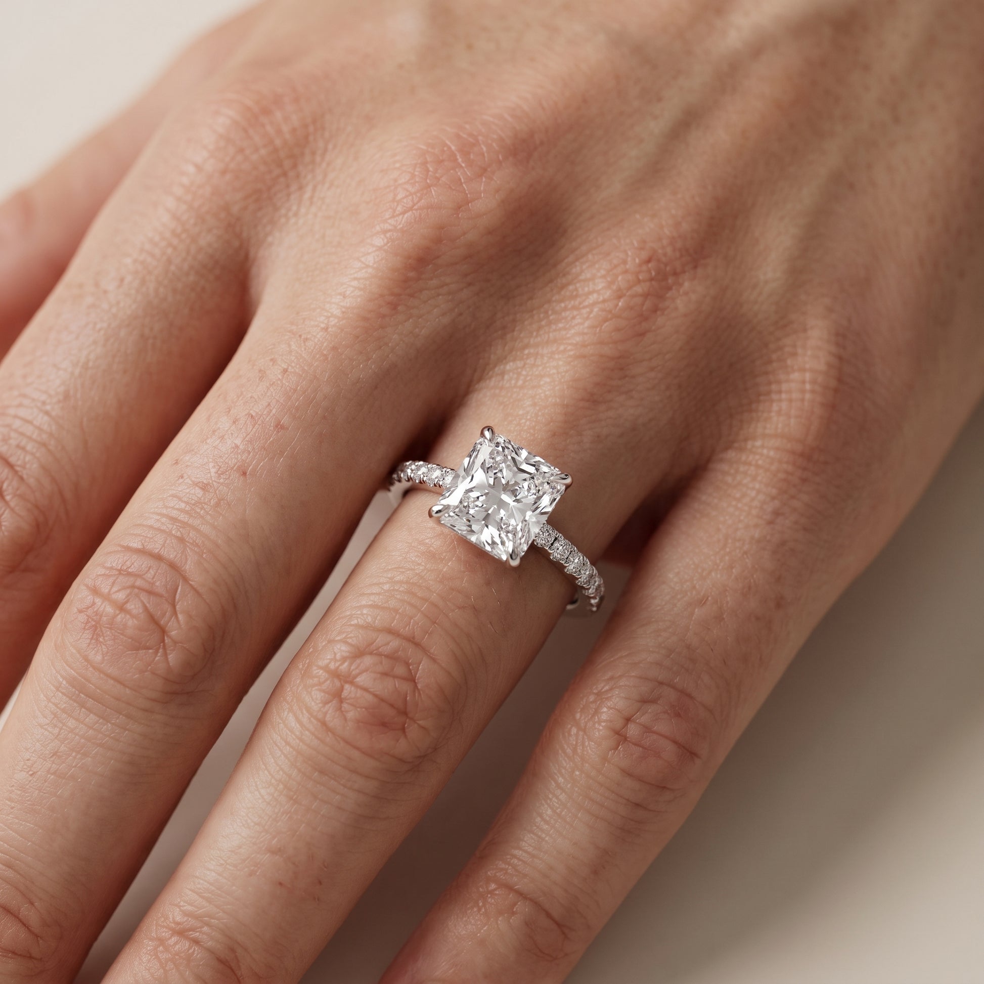 Ione Solitaire Pavé Radiant Diamond Engagement Ring in White Gold - lifestyle.jpg