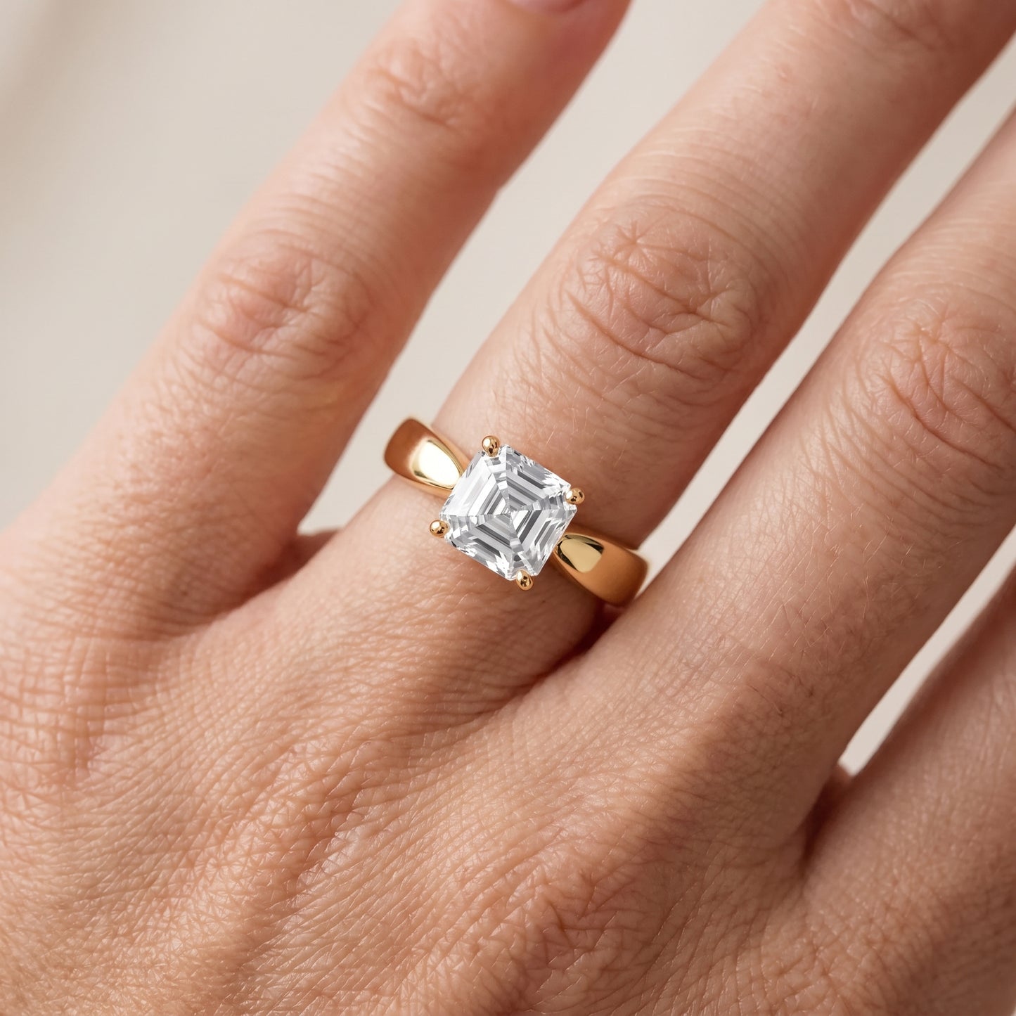 Talia Solitaire Twist Asscher Diamond Engagement Ring in Yellow Gold - lifestyle.jpg