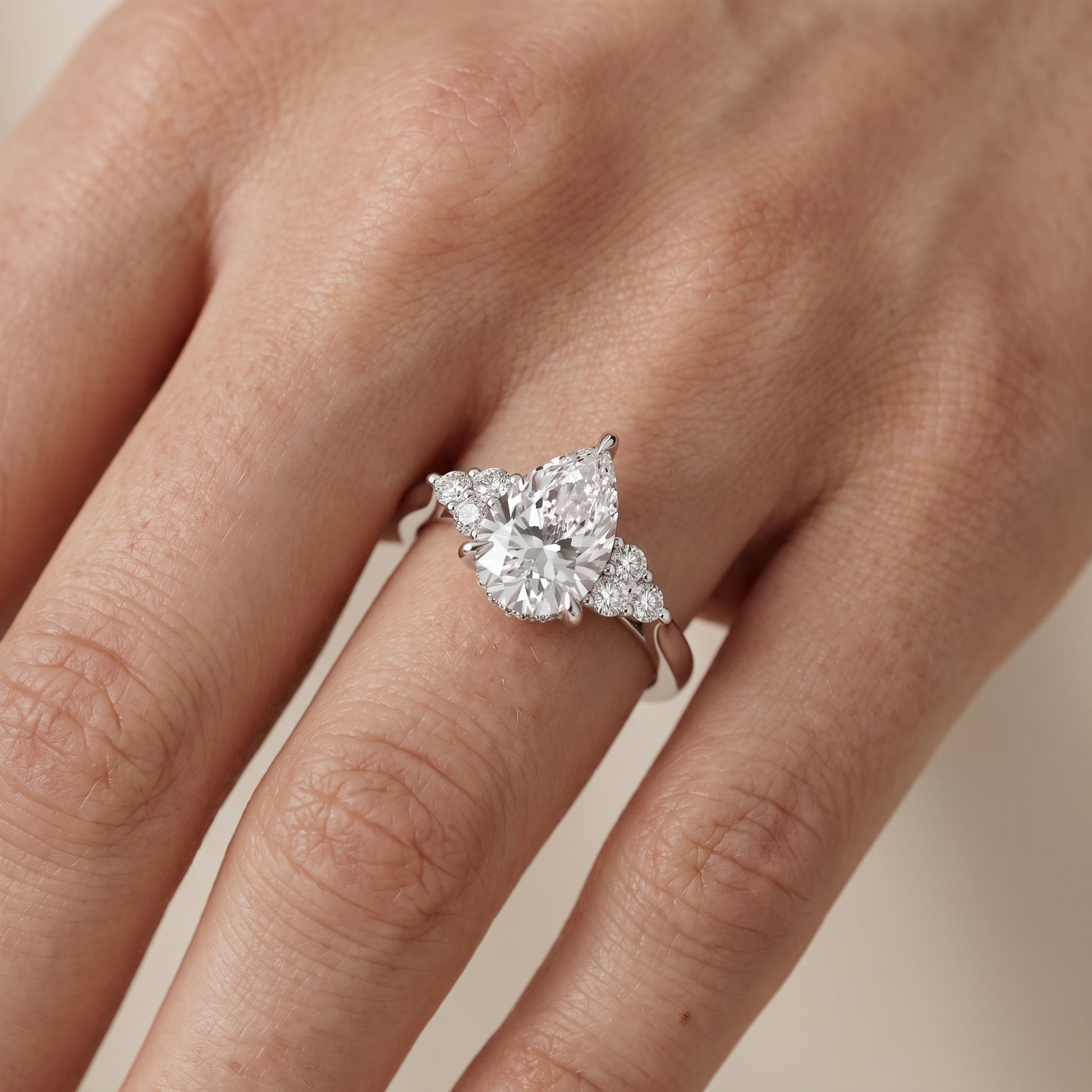 Anya Sidestone Cluster Pear Diamond Ring in White Gold - lifestyle.jpg