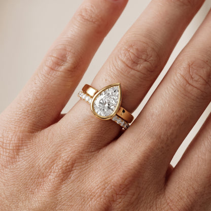 Ayla Bezel Bypass Pear Diamond Ring in Yellow Gold - lifestyle.jpg