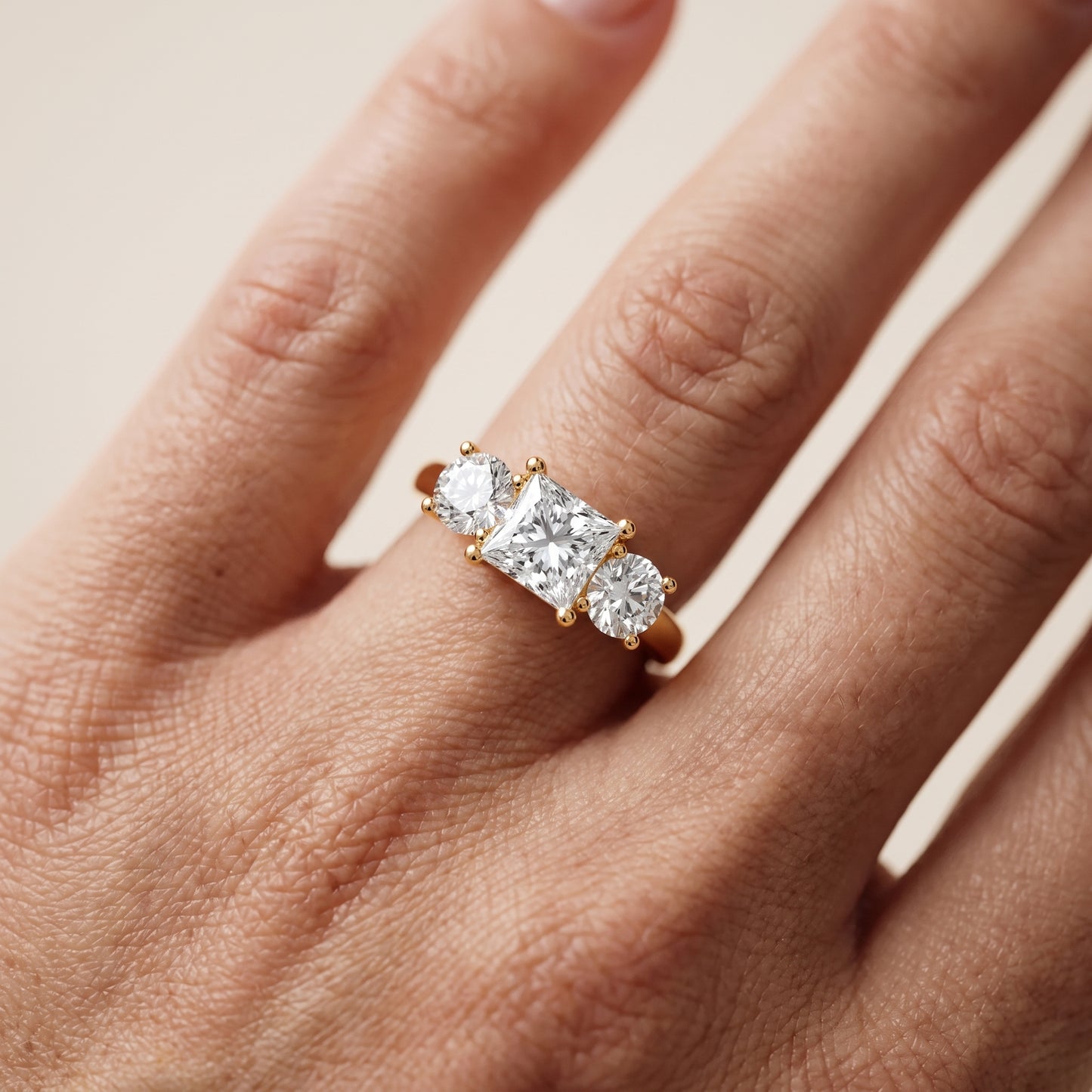 Callie Three-Stone Trellis Princess Diamond Engagement Ring in Yellow Gold - lifestyle.jpg