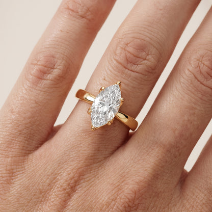 Lucia Solitaire Six-Prong Marquise Diamond Engagement Ring in Yellow Gold - lifestyle.jpg
