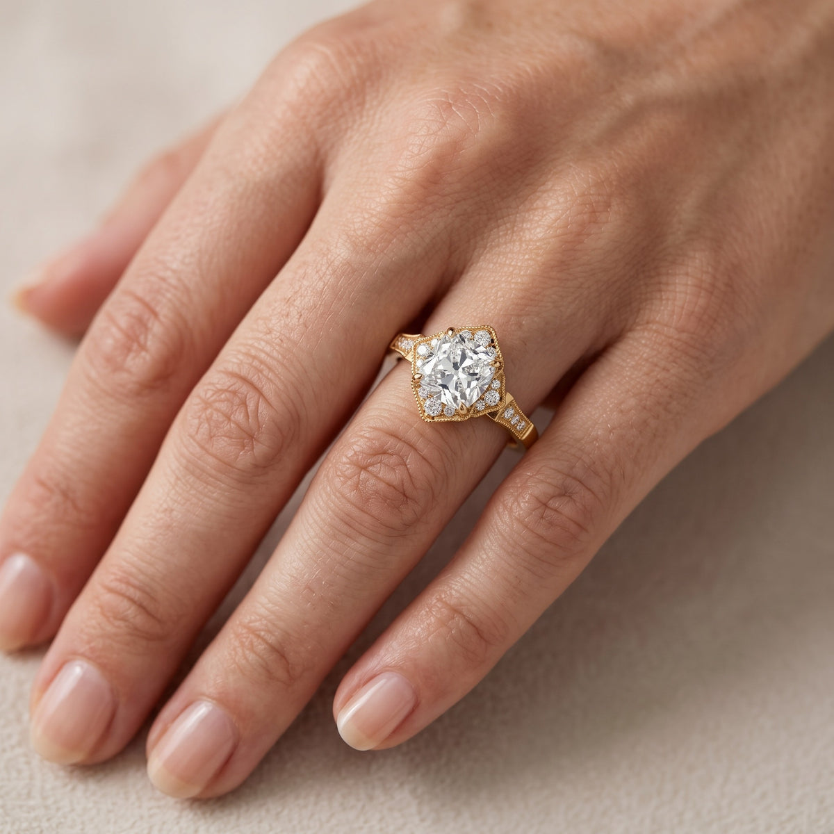 Esther Milgrain Halo Cushion Diamond Engagement Ring in Yellow Gold - lifestyle.jpg