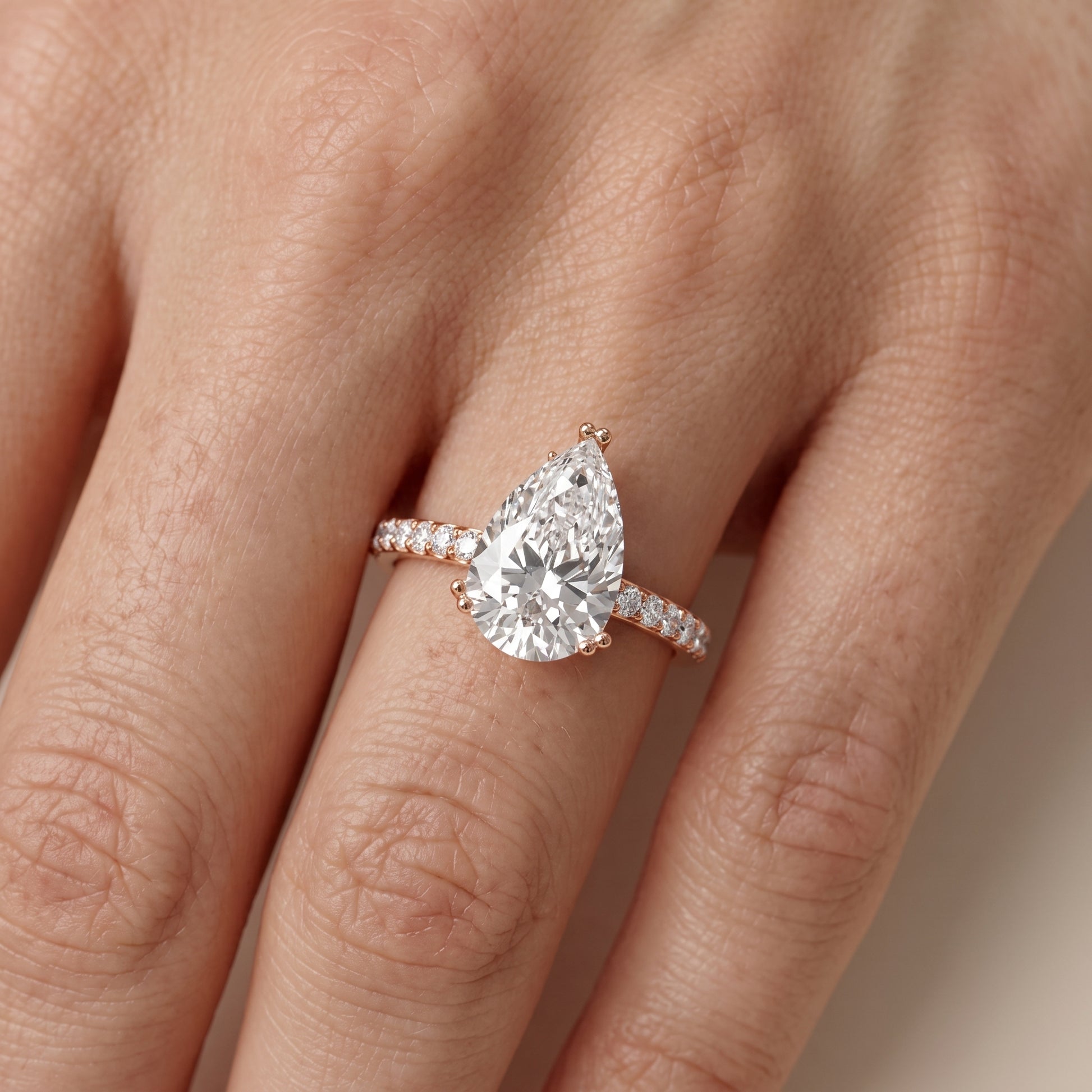 Violet Hidden Halo Pavé Pear Diamond Ring in Rose Gold - lifestyle.jpg