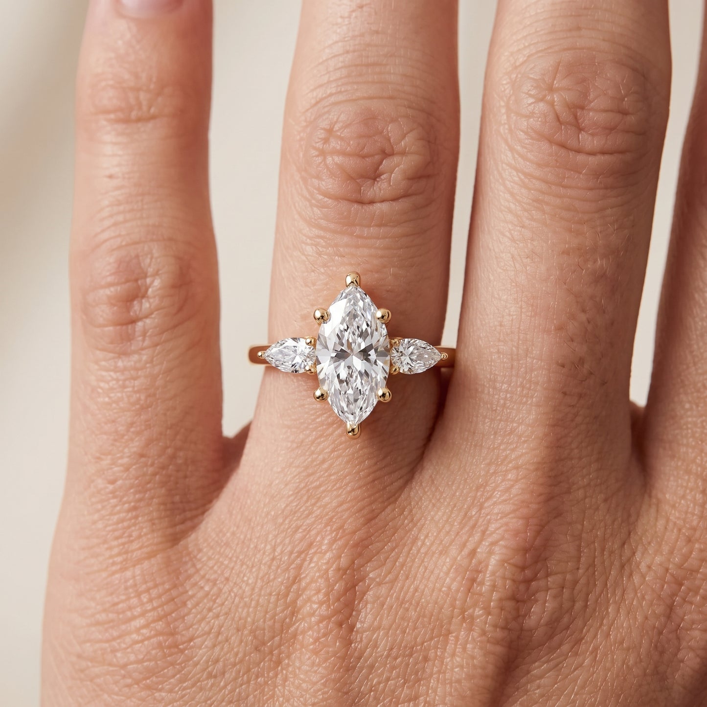 Faye Three-Stone Trellis Marquise Diamond Ring in Yellow Gold - lifestyle.jpg