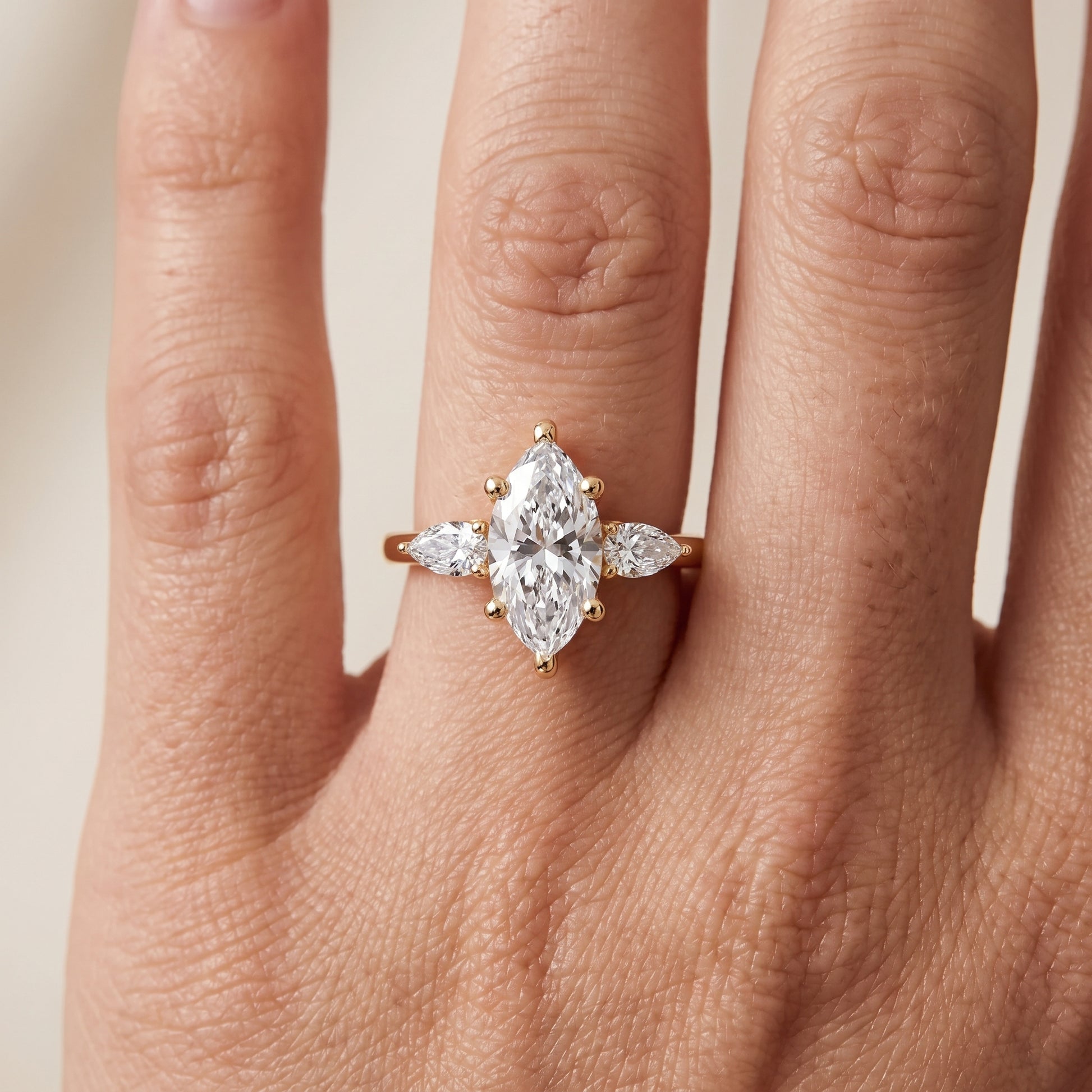 Faye Three-Stone Trellis Marquise Diamond Ring in Yellow Gold - lifestyle.jpg