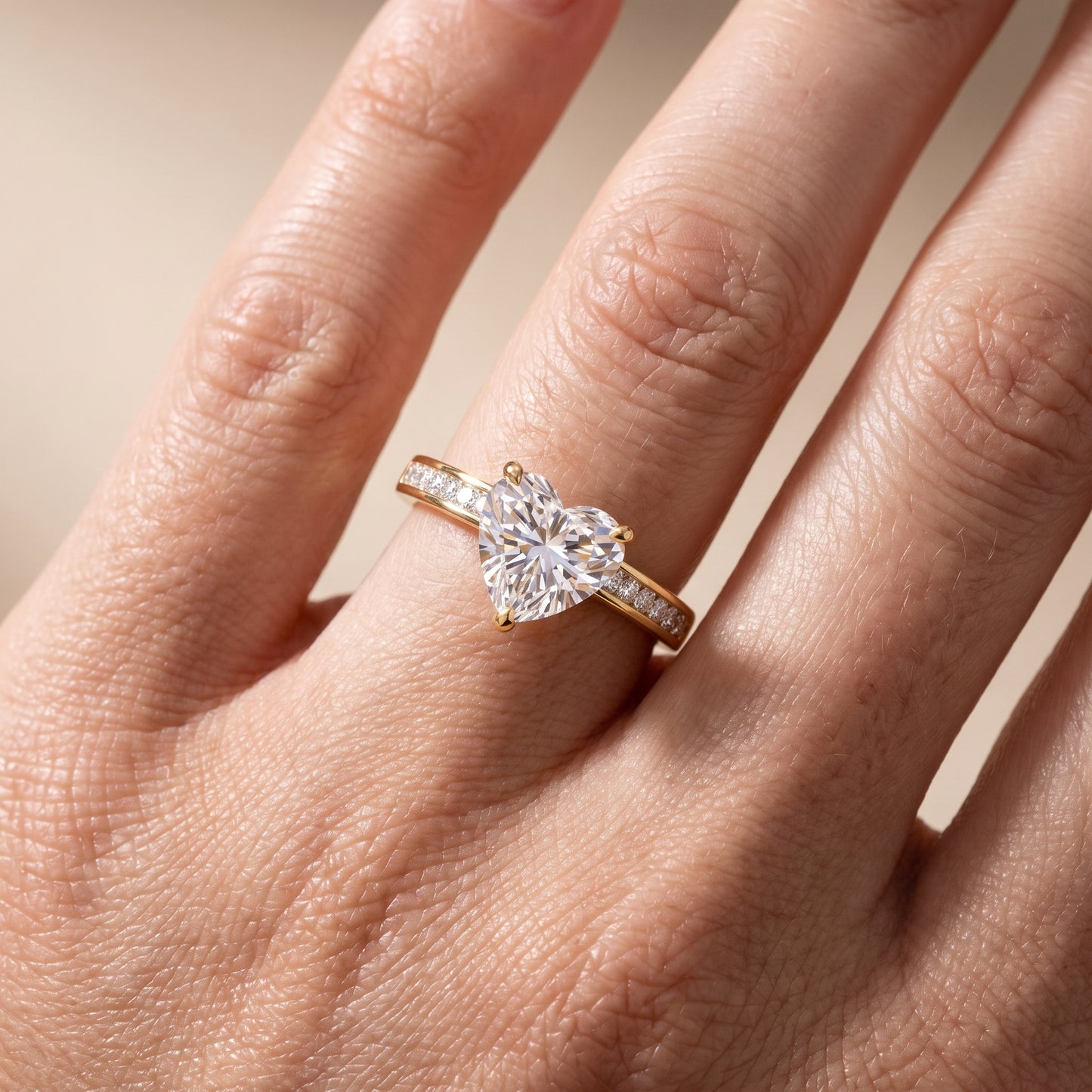 Maren Sidestone Channel Set Heart Diamond Engagement Ring in Yellow Gold - lifestyle.jpg