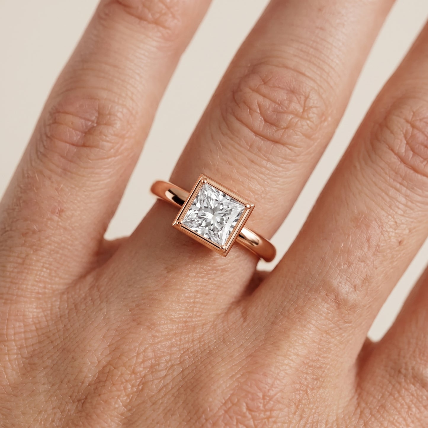 Alina Bezel Solitaire Princess Diamond Ring in Rose Gold - lifestyle.jpg