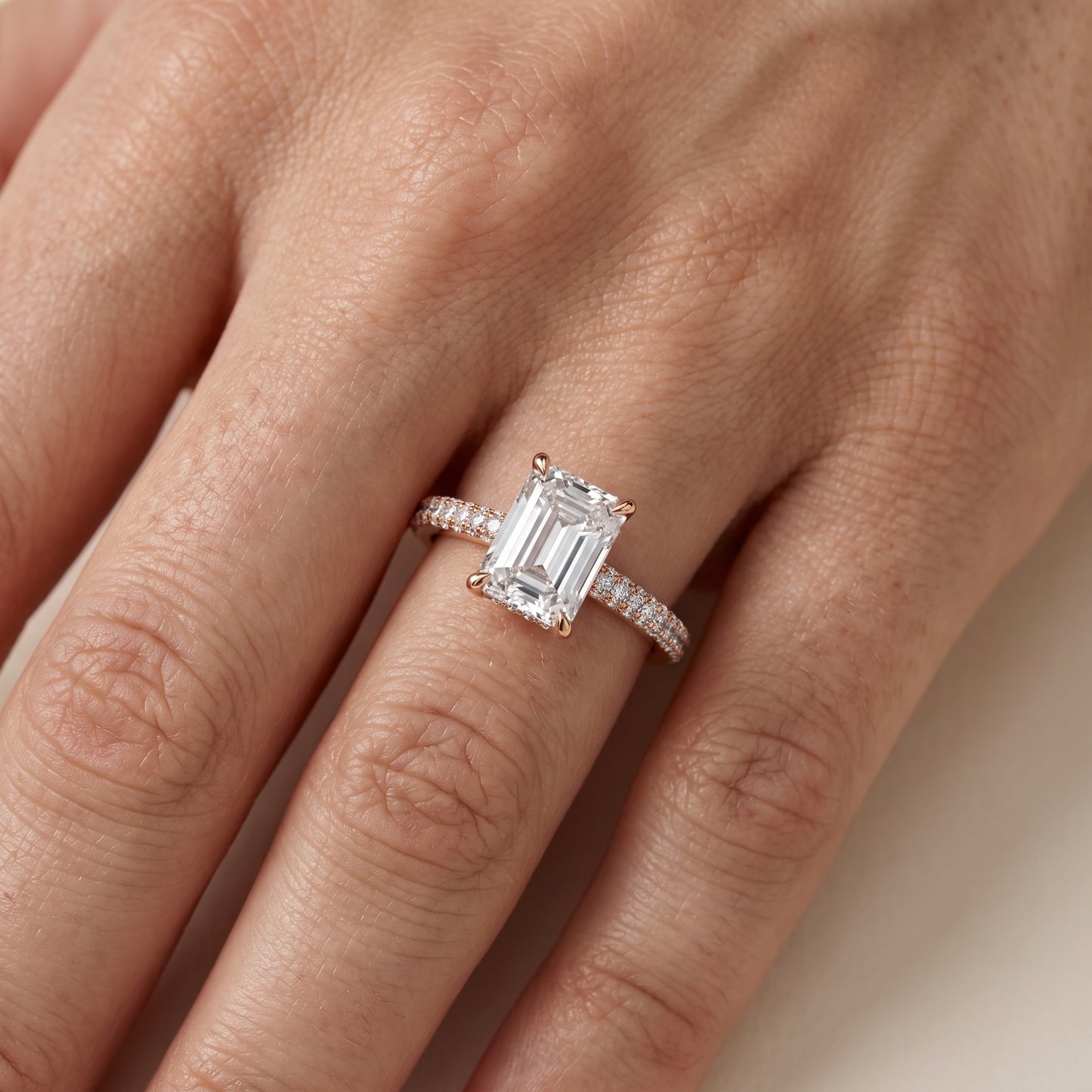 Della Hidden Halo Pavé Emerald Diamond Engagement Ring in Rose Gold - lifestyle.jpg