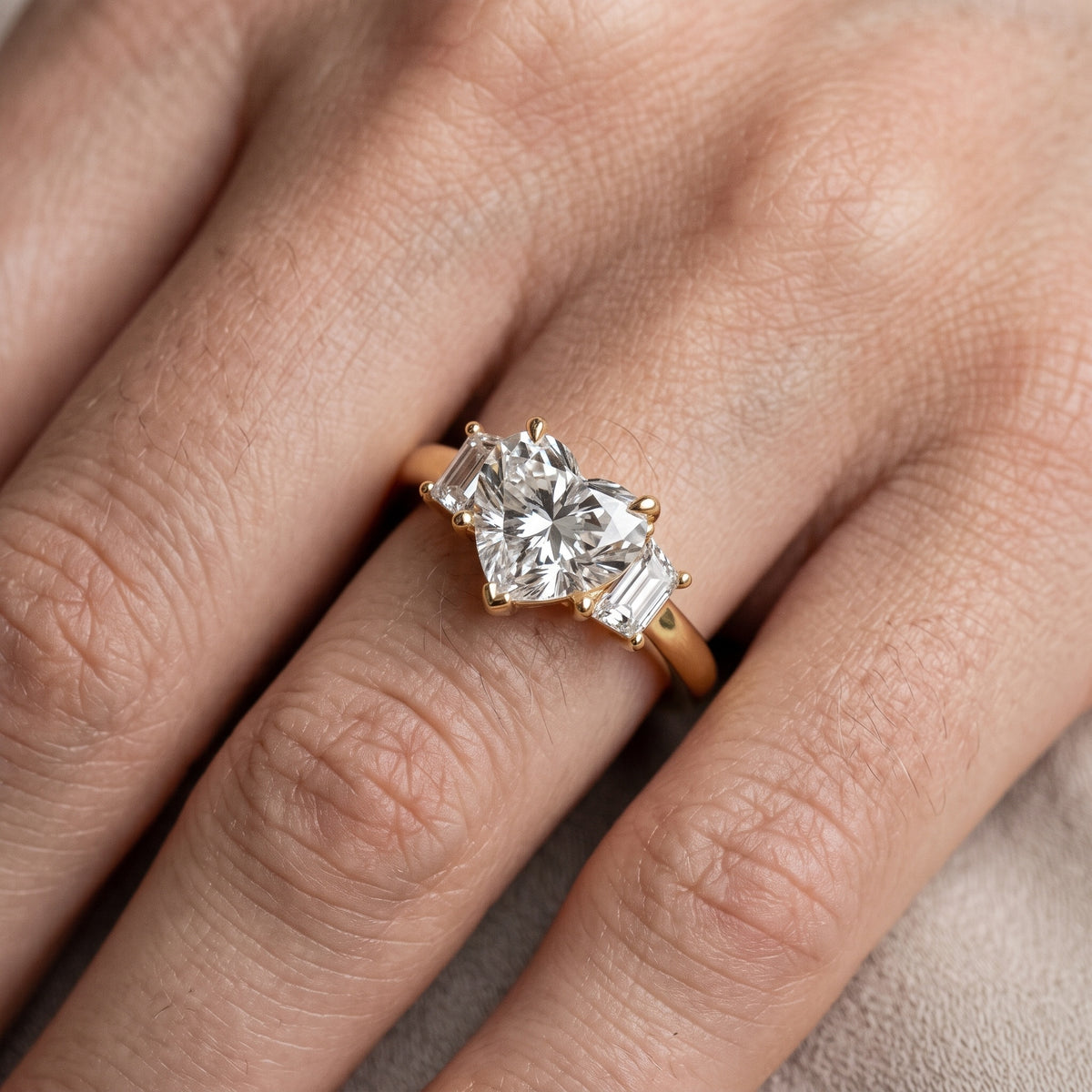 Federica Trapezoid Three-Stone Heart Diamond Engagement Ring in Rose Gold - lifestyle.jpg