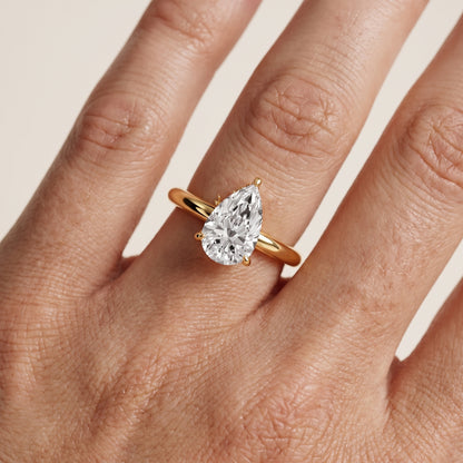 Amaya Hidden Halo Pear Diamond Ring in Yellow Gold - lifestyle.jpg