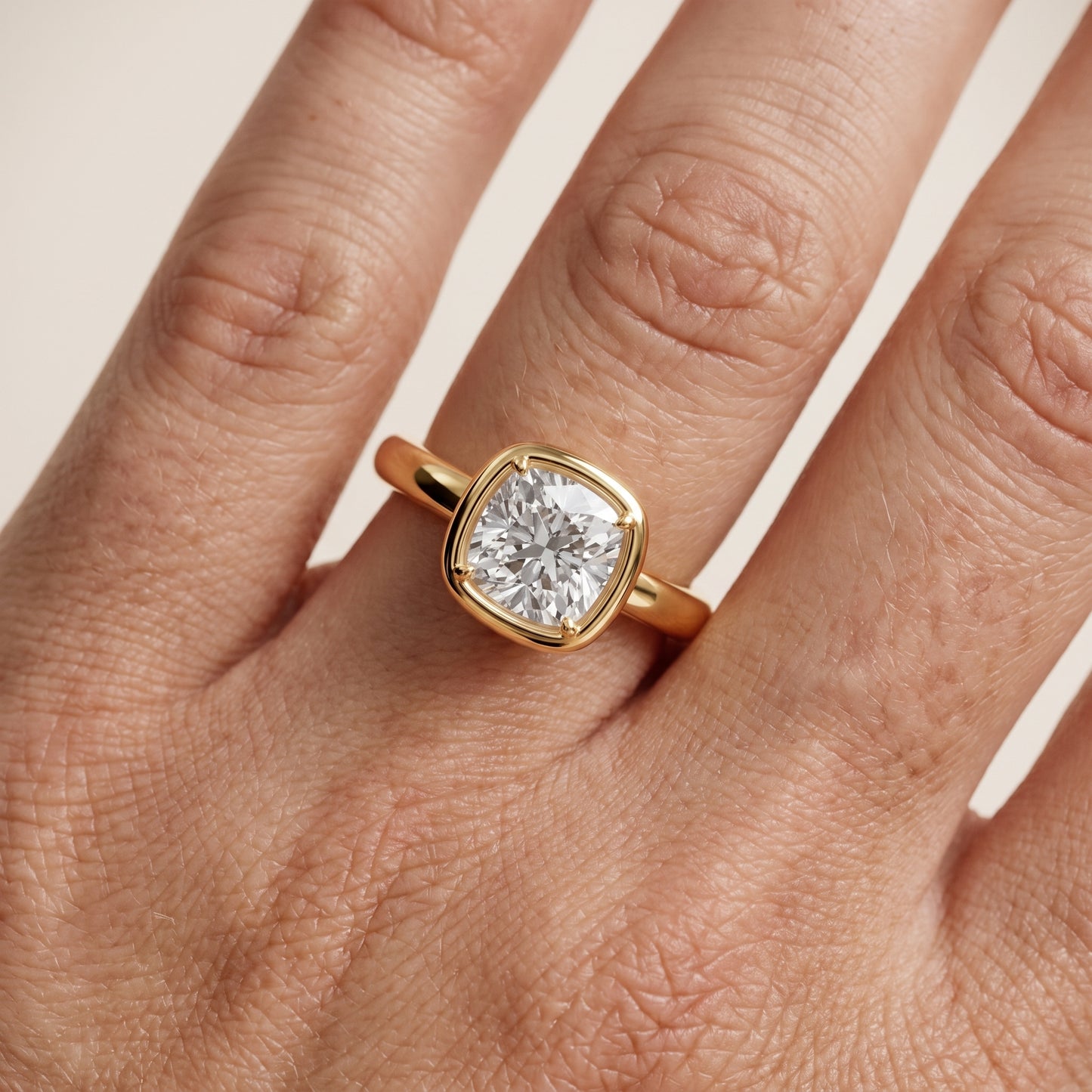 Alina Bezel Solitaire Cushion Diamond Ring in Yellow Gold - lifestyle.jpg