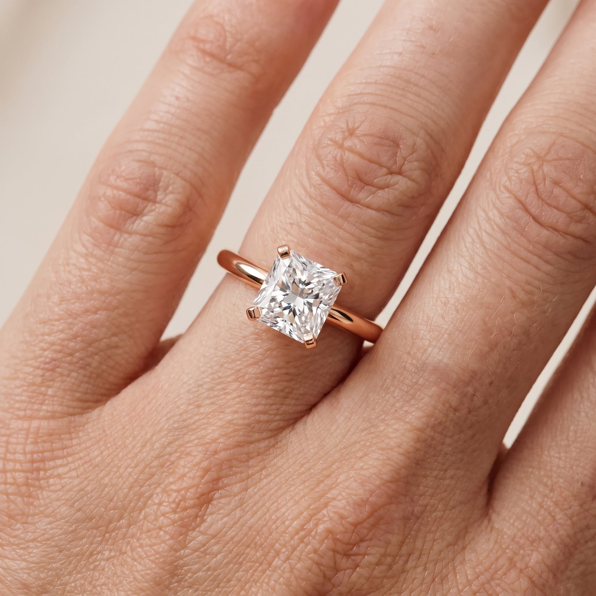 Amira Six-Prong Solitaire Radiant Diamond Engagement Ring in Rose Gold - lifestyle.jpg