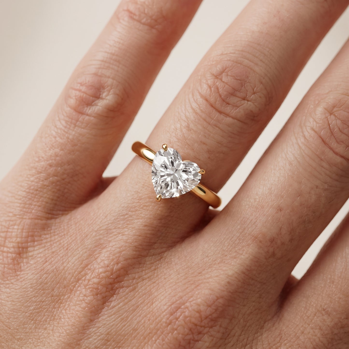 Kalia Knife Edge Solitaire Heart Diamond Engagement Ring in Yellow Gold - lifestyle.jpg