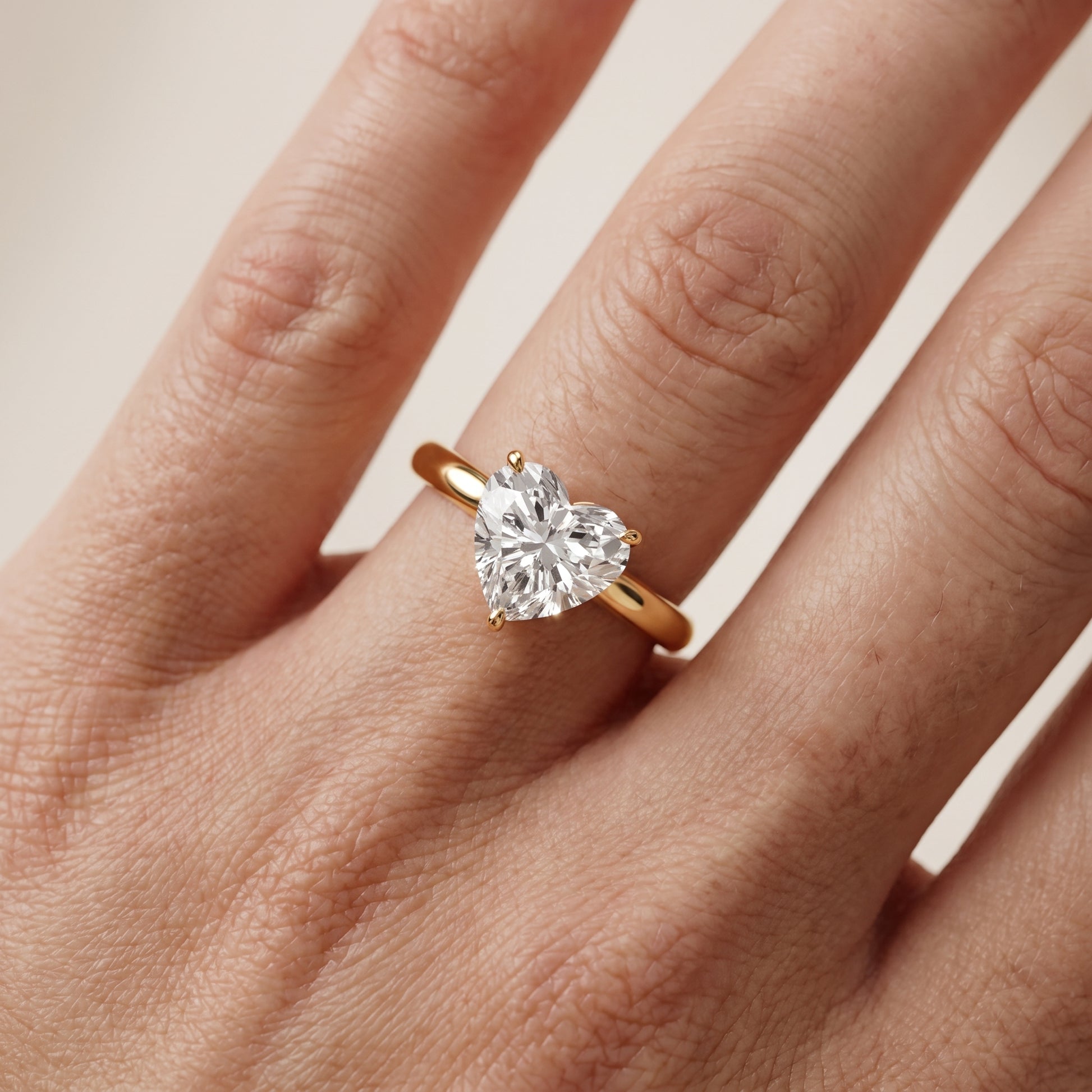 Kalia Knife Edge Solitaire Heart Diamond Engagement Ring in Yellow Gold - lifestyle.jpg