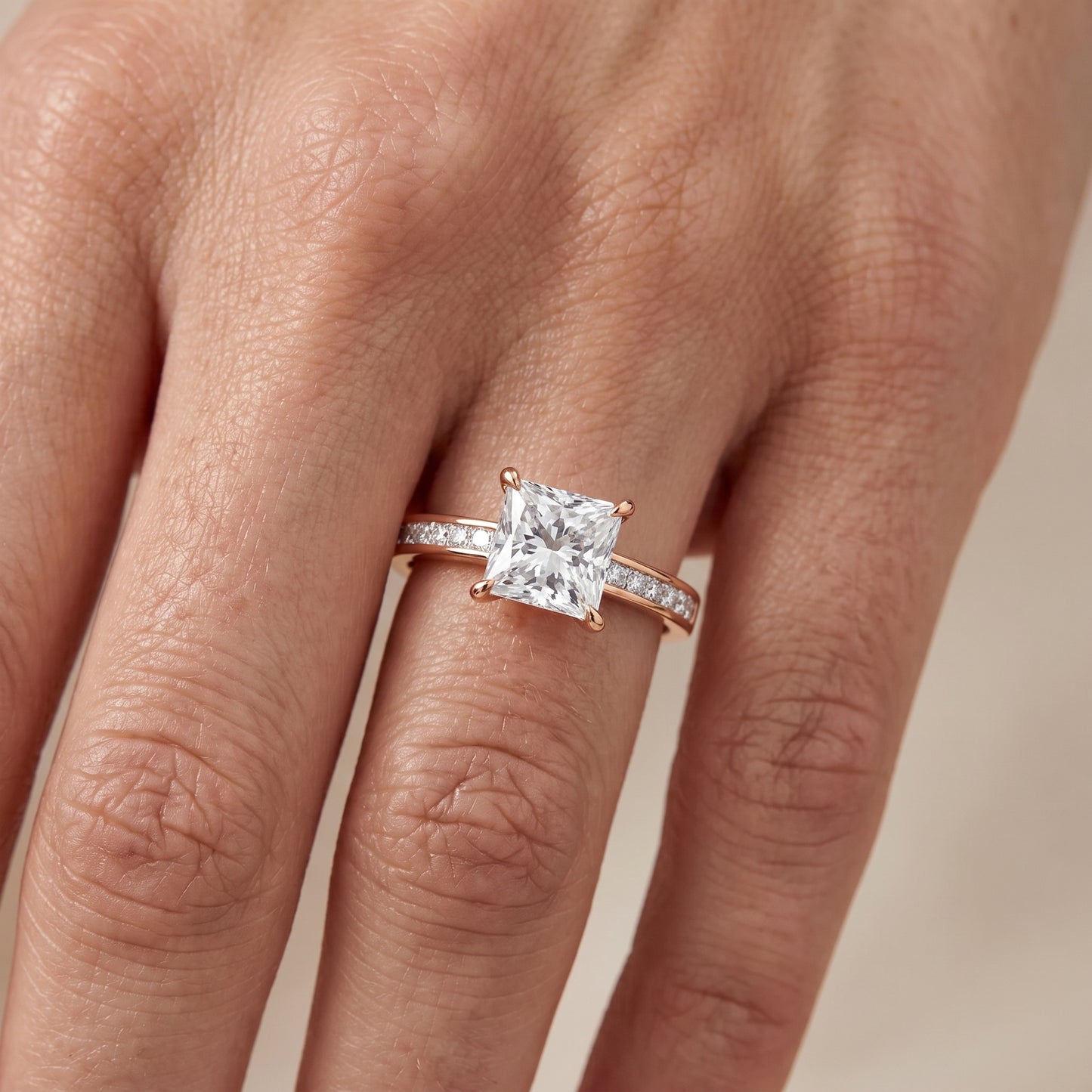 Maren Sidestone Channel Set Princess Diamond Engagement Ring in Rose Gold - lifestyle.jpg