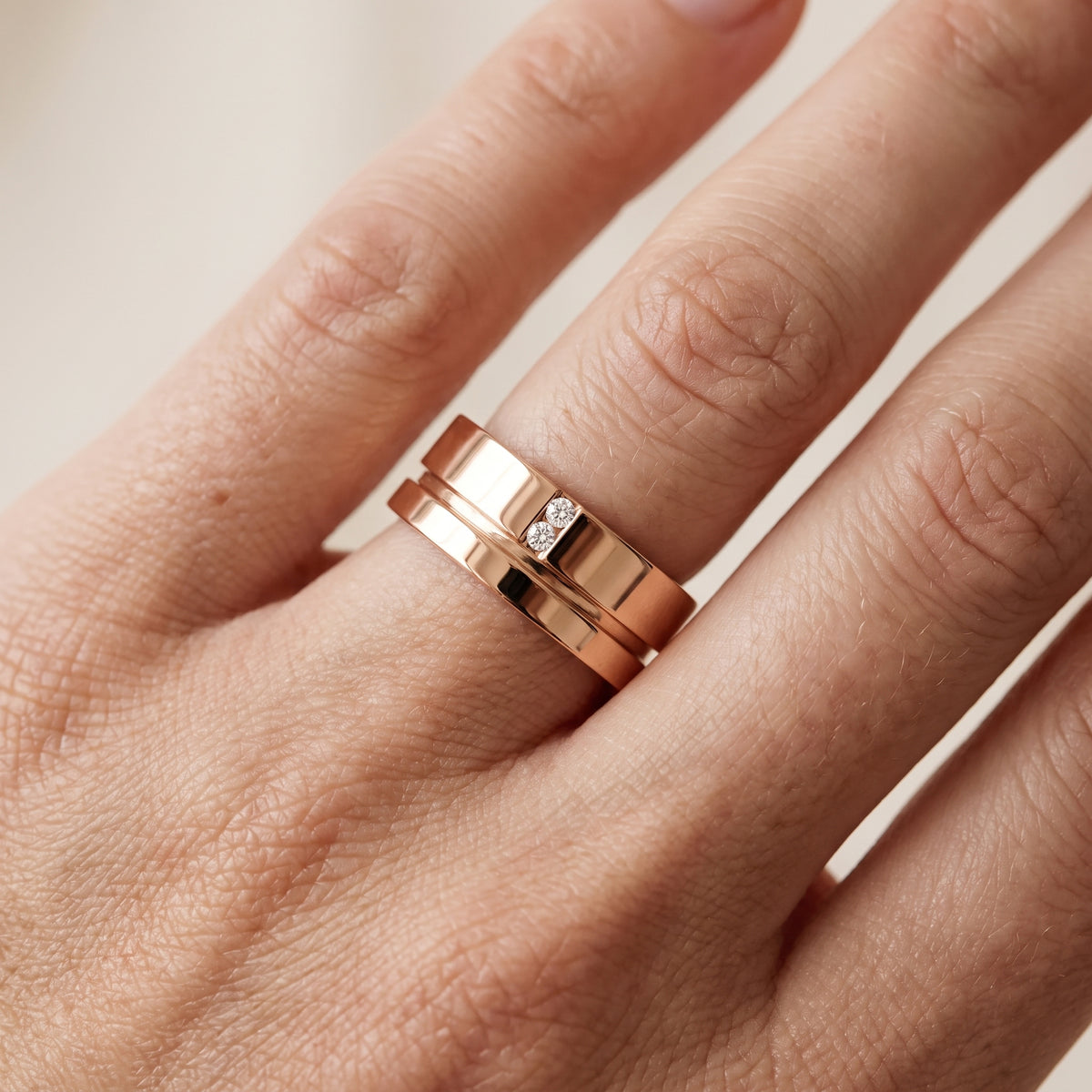 Daisy Flat Grooved Round Diamond Wedding Band in Rose Gold - lifestyle.jpg