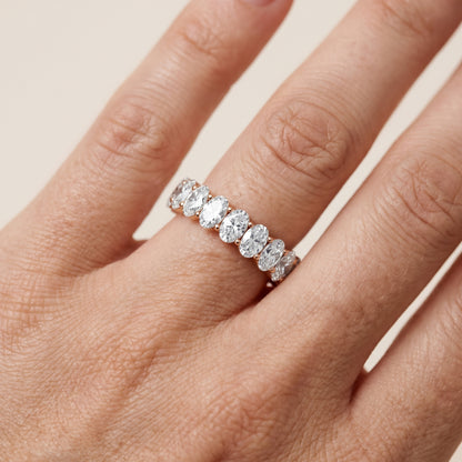 Marlowe Shared Prong Oval Diamond Eternity Band in Rose Gold - lifestyle.jpg