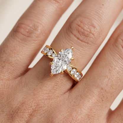 Noor Channel Set Sidestone Marquise Diamond Engagement Ring in Yellow Gold - lifestyle.jpg