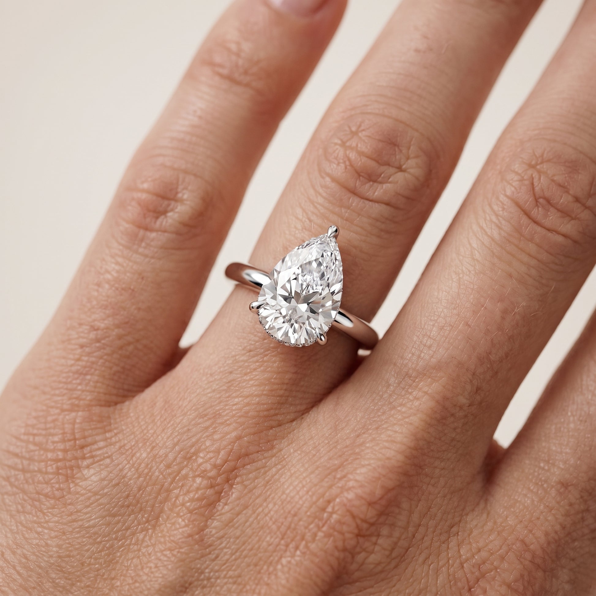 Amaya Hidden Halo Pear Diamond Ring in White Gold - lifestyle.jpg