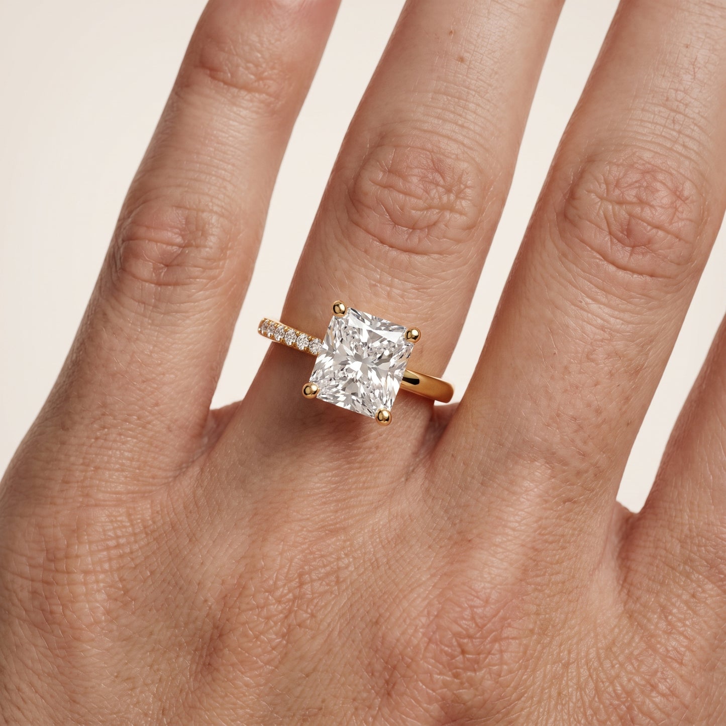 Rosie Solitaire Basket Radiant Diamond Engagement Ring in Yellow Gold - lifestyle.jpg