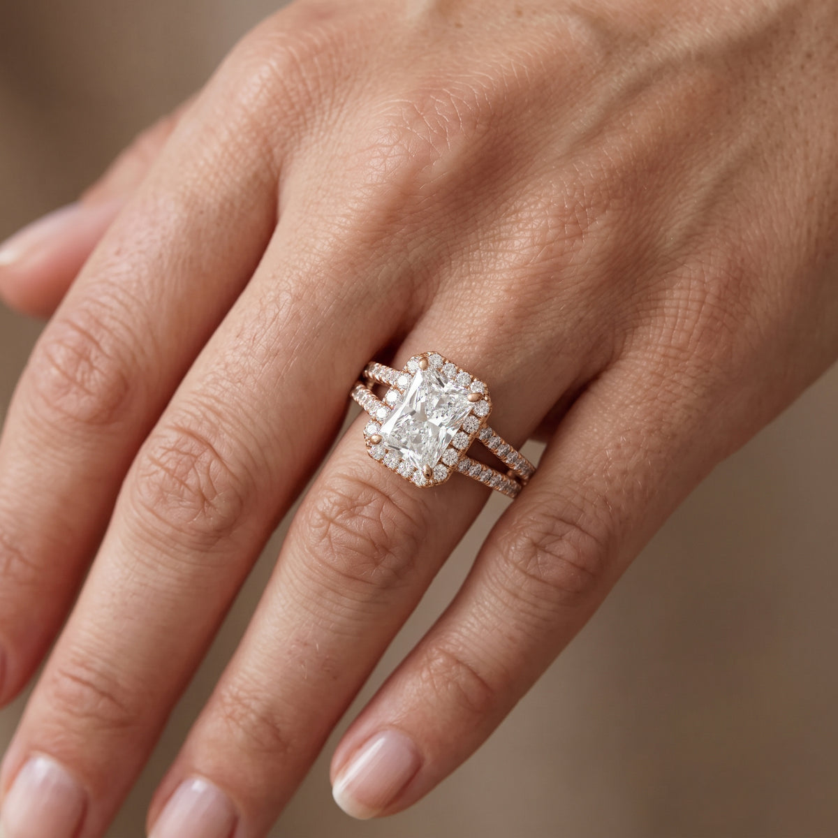 Kira Halo Split Shank Radiant Diamond Engagement Ring in Rose Gold - lifestyle.jpg