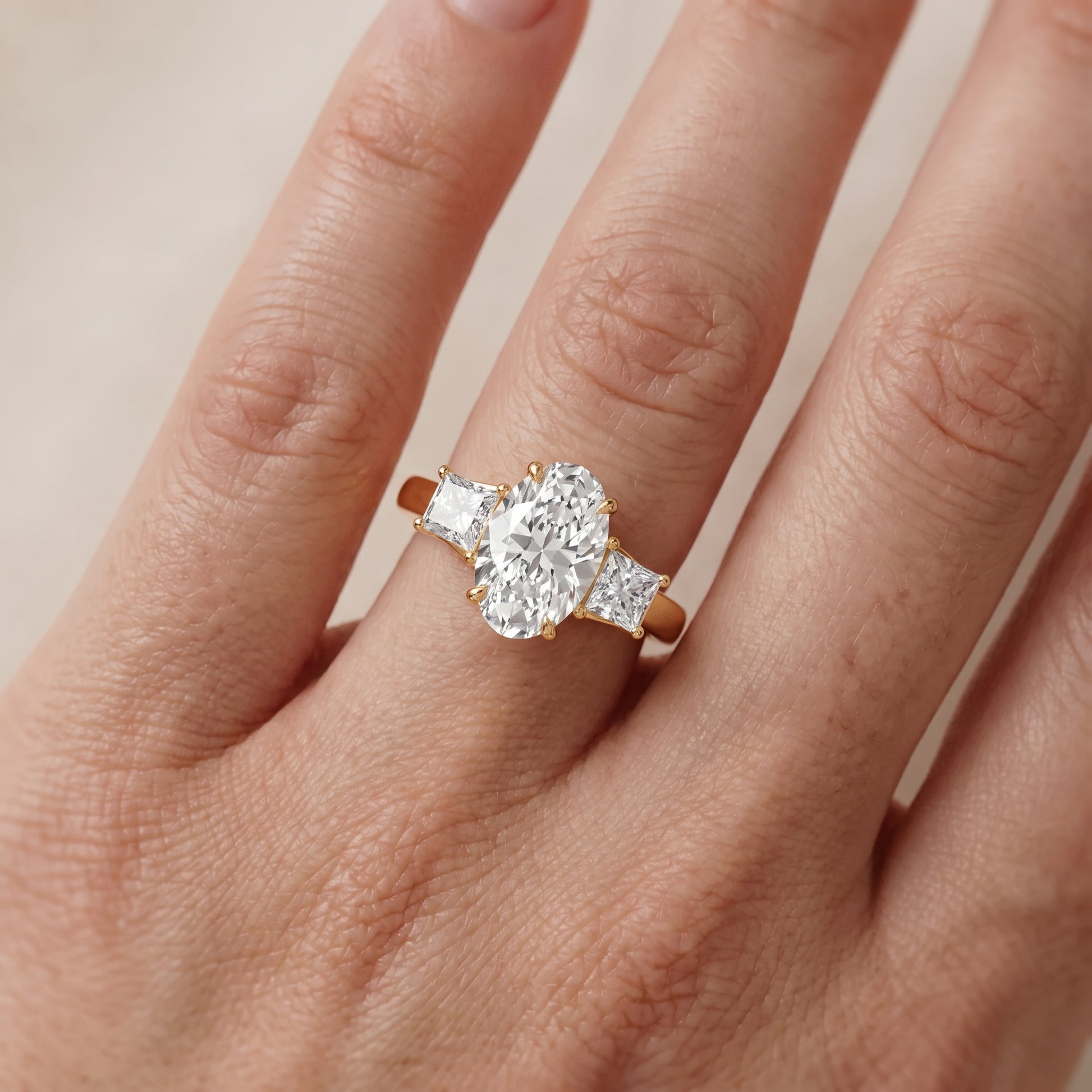 Selena Three-Stone Basket Oval Diamond Ring in Yellow Gold - lifestyle.jpg