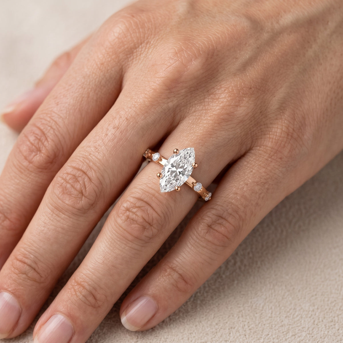 Elena Radiance Solitaire Marquise Diamond Engagement Ring in Rose Gold - lifestyle.jpg