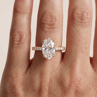 Aisha Pavé Solitaire Oval Diamond Engagement Ring in Yellow Gold - lifestyle.jpg