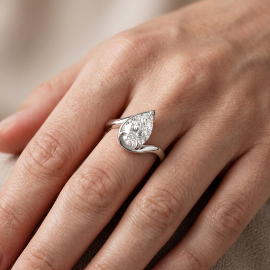 Tabitha Bypass Partial Bezel Pear Diamond Engagement Ring in Platinum - lifestyle.jpg