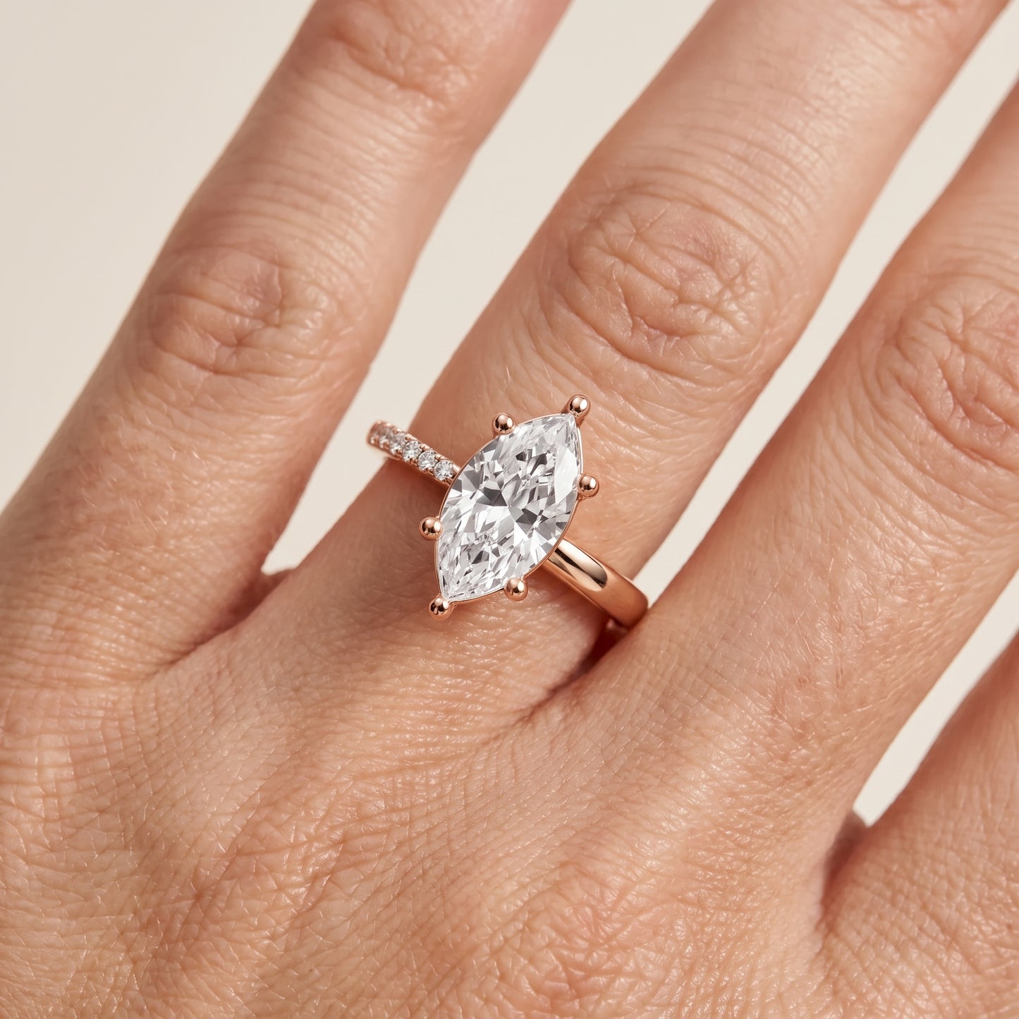 Rosie Solitaire Basket Marquise Diamond Engagement Ring in Rose Gold - lifestyle.jpg