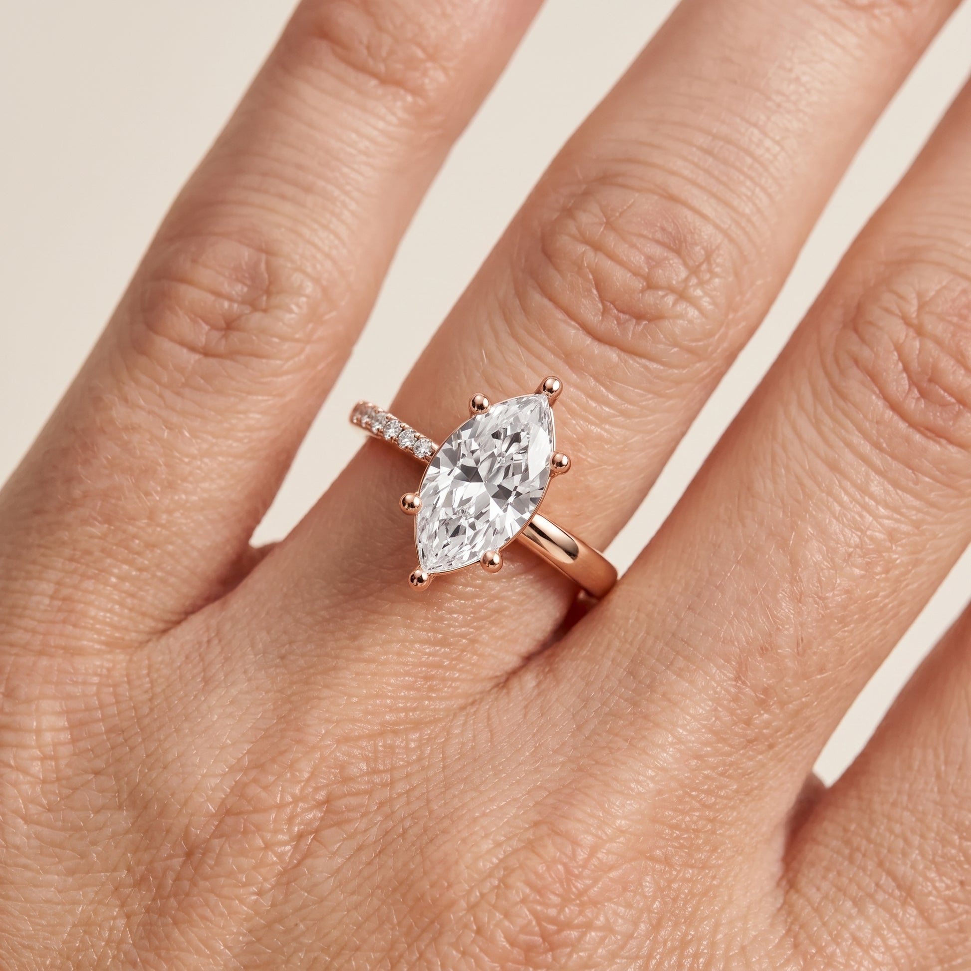Rosie Solitaire Basket Marquise Diamond Engagement Ring in Rose Gold - lifestyle.jpg