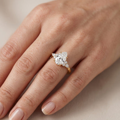 Amelia Three Stone Pear Diamond Engagement Ring in Yellow Gold - lifestyle.jpg