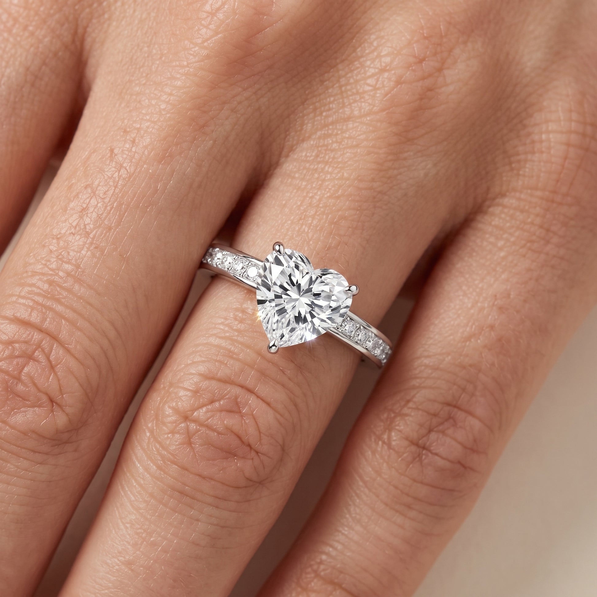Brielle Channel Set Solitaire Heart Diamond Ring in Platinum - lifestyle.jpg