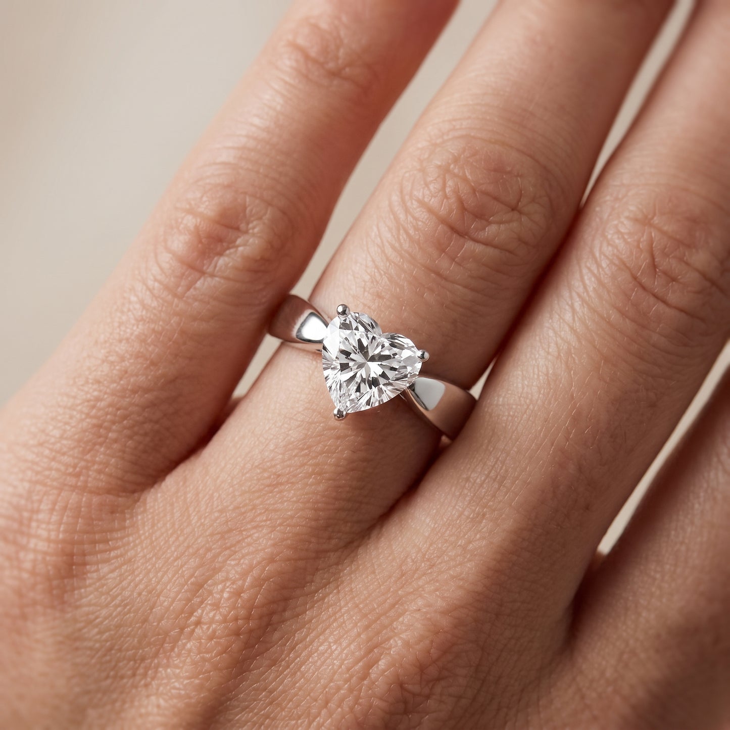 Talia Solitaire Twist Heart Diamond Engagement Ring in White Gold - lifestyle.jpg