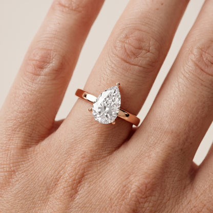 Delia Solitaire Pear Diamond Engagement Ring in Rose Gold - lifestyle.jpg