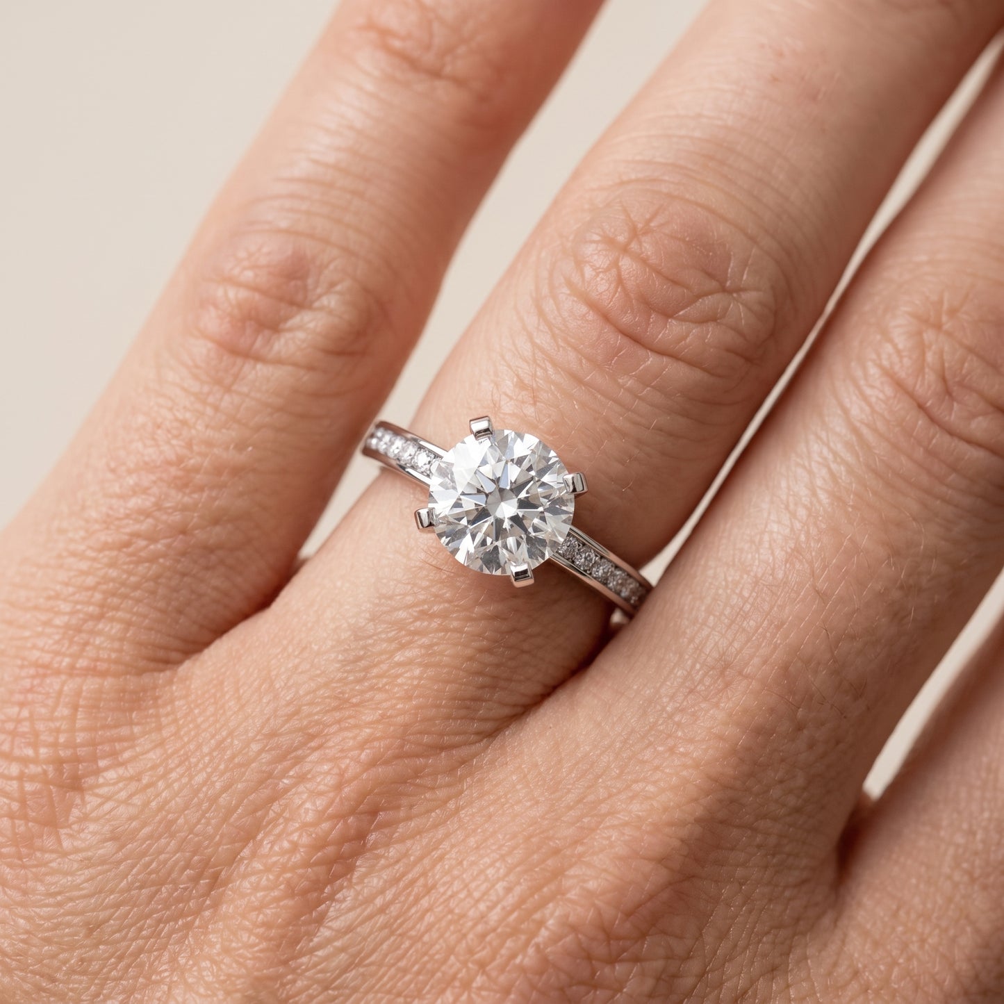 Tessa Solitaire Channel Set Round Diamond Engagement Ring in Platinum - lifestyle.jpg