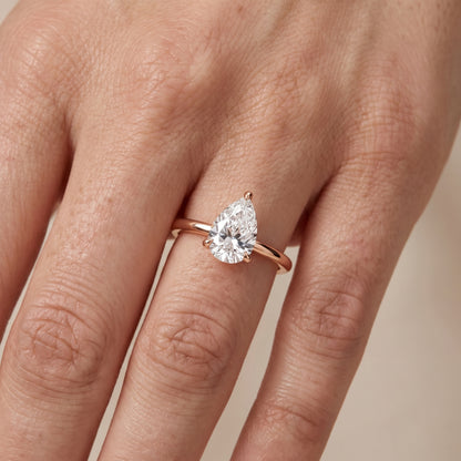 Nella Petite Solitaire Pear Diamond Engagement Ring in Rose Gold - lifestyle.jpg
