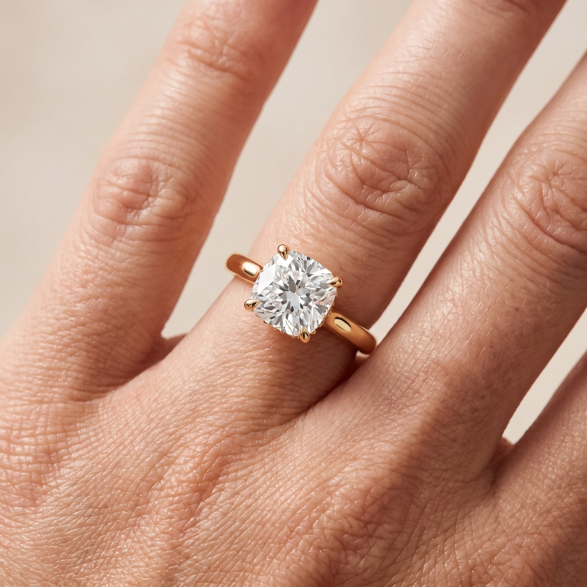 Mena Hidden Halo Cushion Diamond Engagement Ring in Yellow Gold - lifestyle.jpg