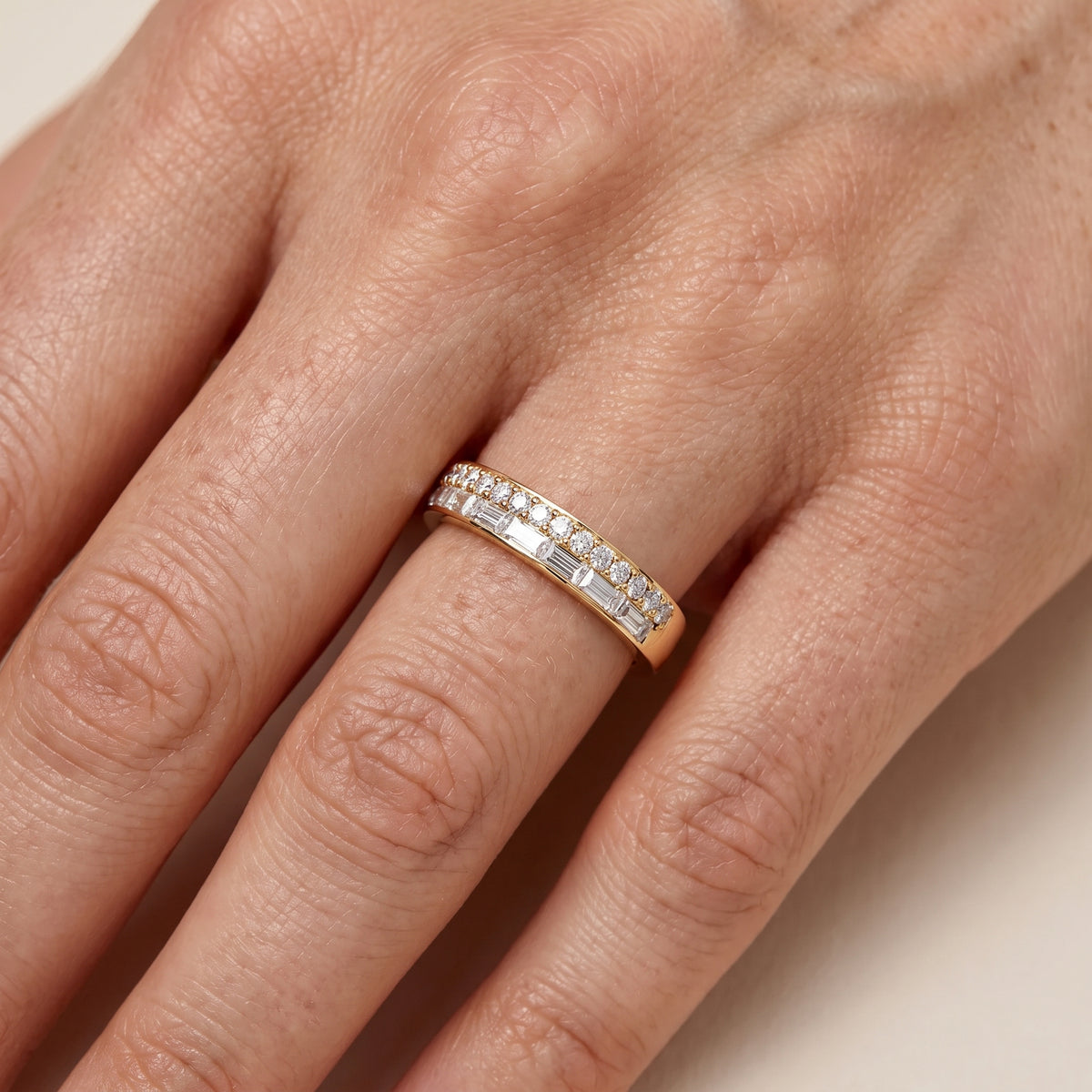 Genevieve Channel Set Round & Baguette Diamond Anniversary Ring in Yellow Gold - lifestyle.jpg