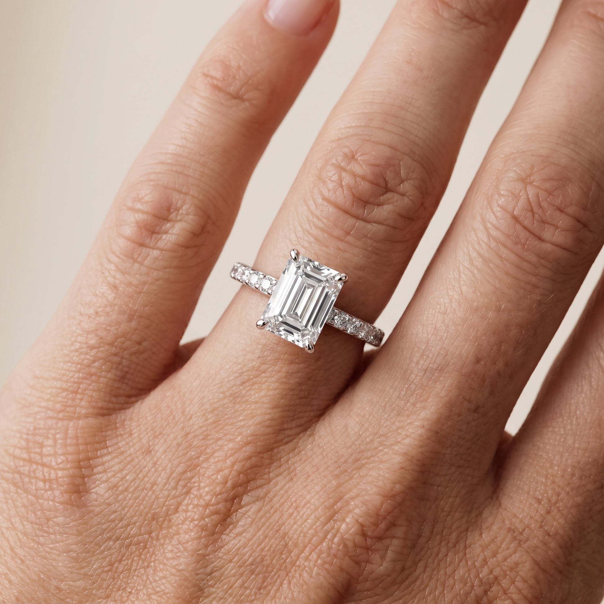 Aisha Pavé Solitaire Emerald Diamond Engagement Ring in White Gold - lifestyle.jpg