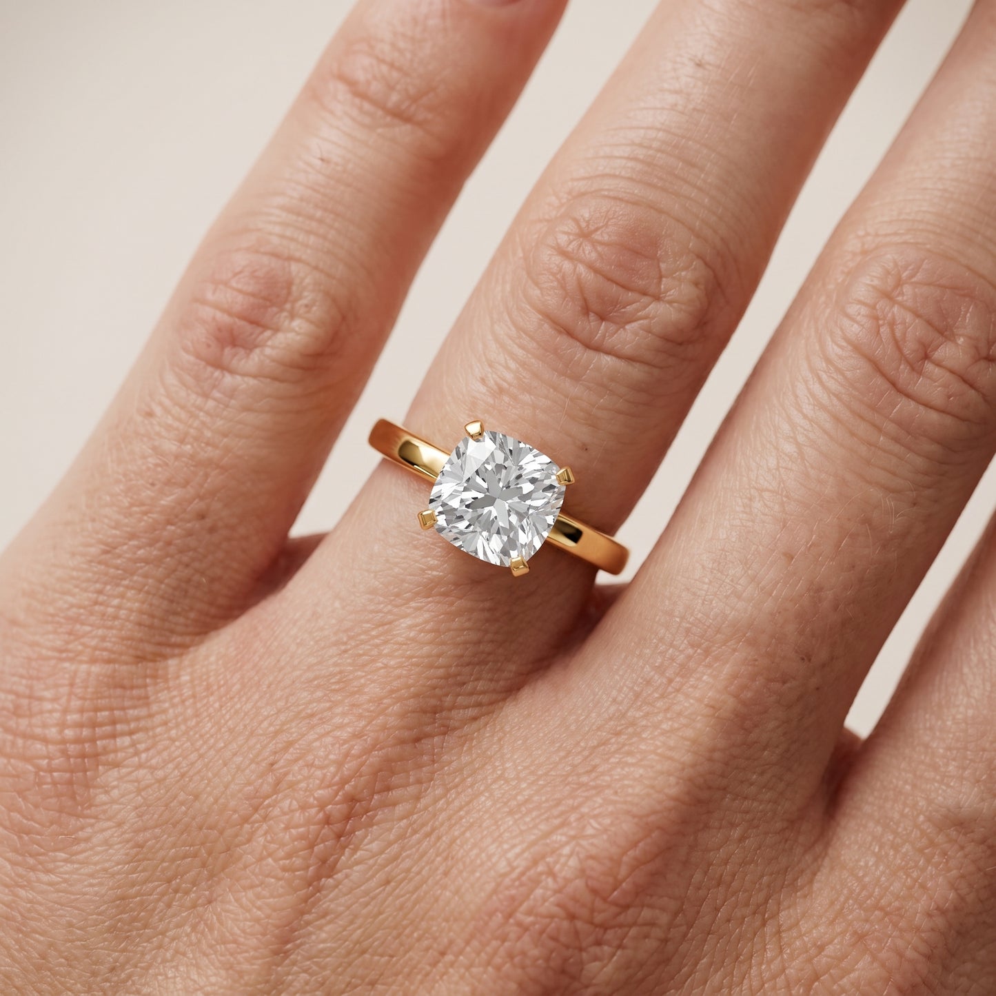 Liana Solitaire Claw Prong Cushion Diamond Engagement Ring in Yellow Gold - lifestyle.jpg
