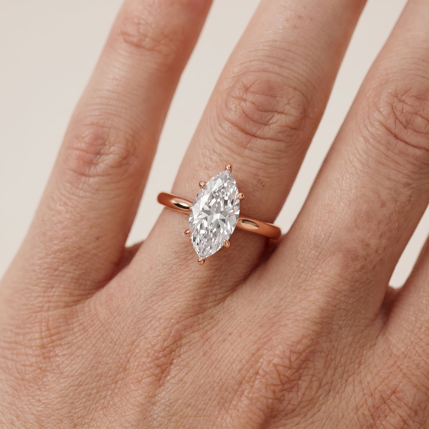Kalia Knife Edge Solitaire Marquise Diamond Engagement Ring in Rose Gold - lifestyle.jpg