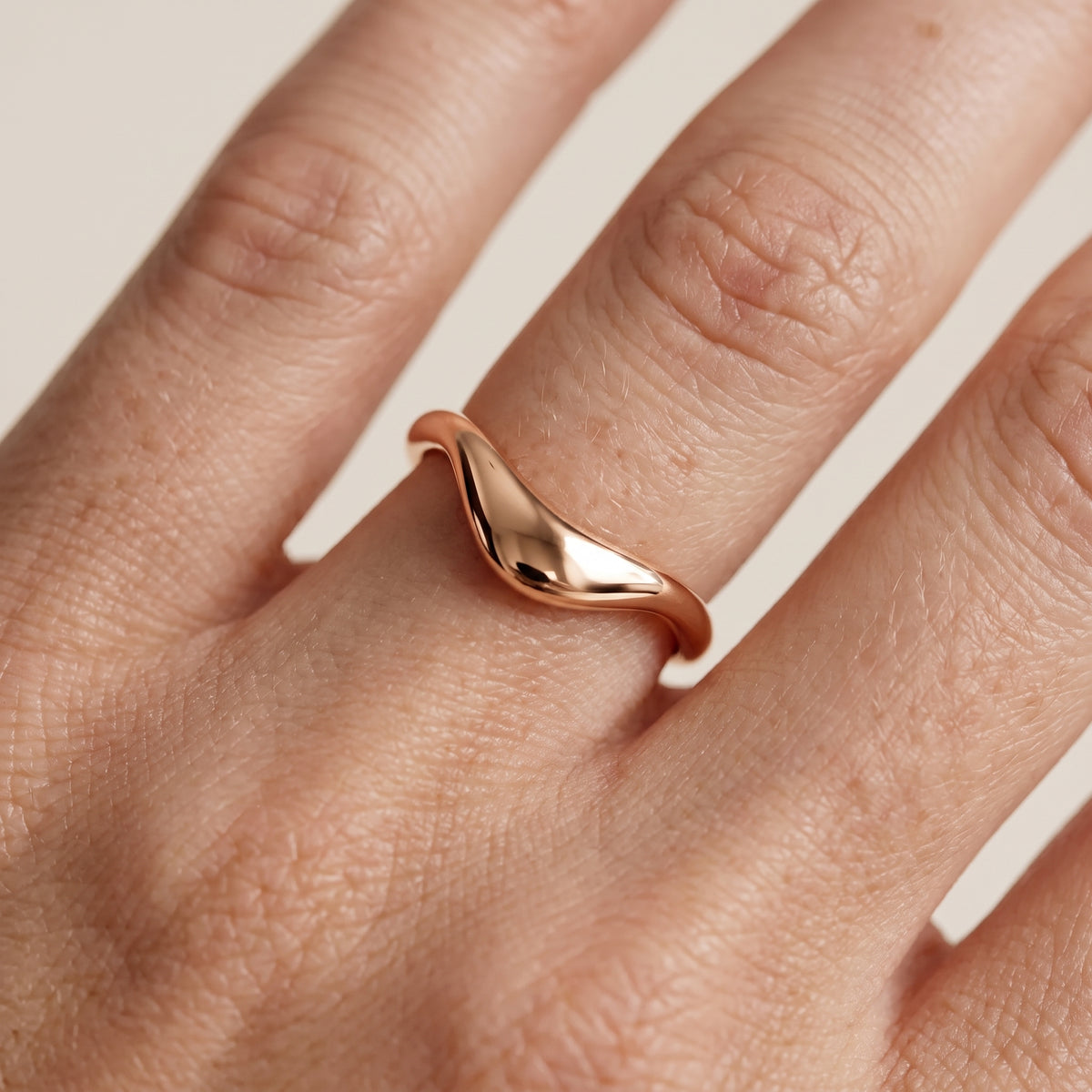 Gwendolyn Curved Contour Wedding Band in Rose Gold - lifestyle.jpg