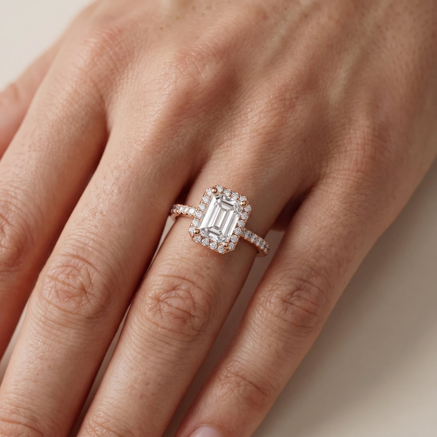 Sophie Halo Pavé Emerald Diamond Ring in Rose Gold - lifestyle.jpg
