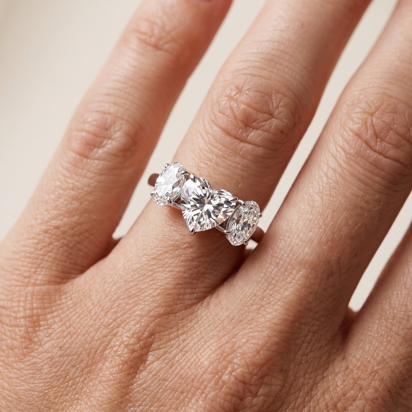 Lila Three-Stone Heart Diamond Ring in Platinum - lifestyle.jpg