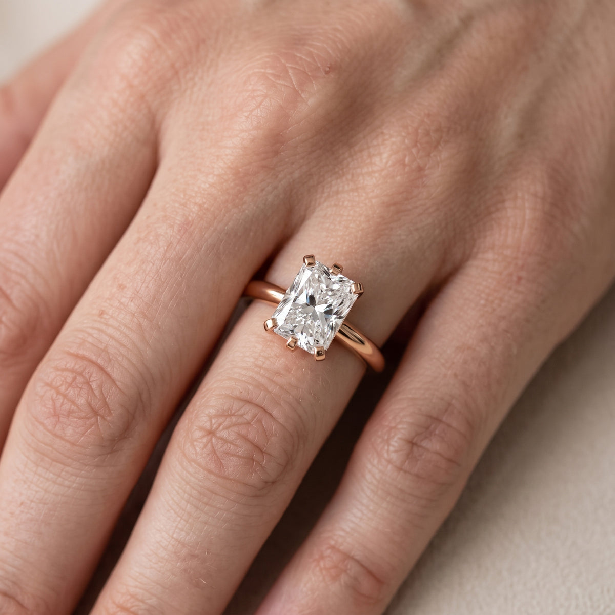 Arabella Six-Prong Solitaire Radiant Diamond Engagement Ring in Rose Gold - lifestyle.jpg